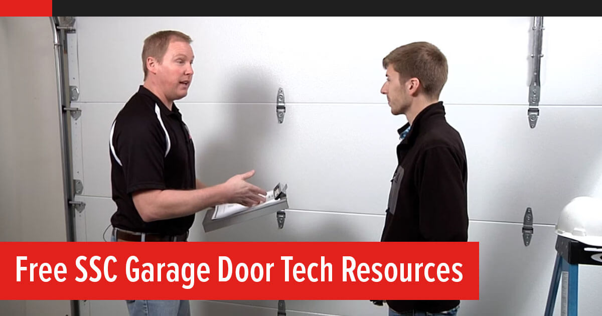 Free SSC Garage Door Tech Resources. Two men talking in front of closed garage door